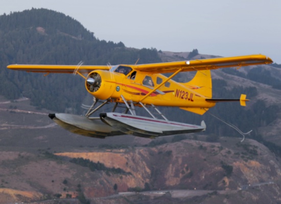 beaver seaplane soaring above san francisco on tour